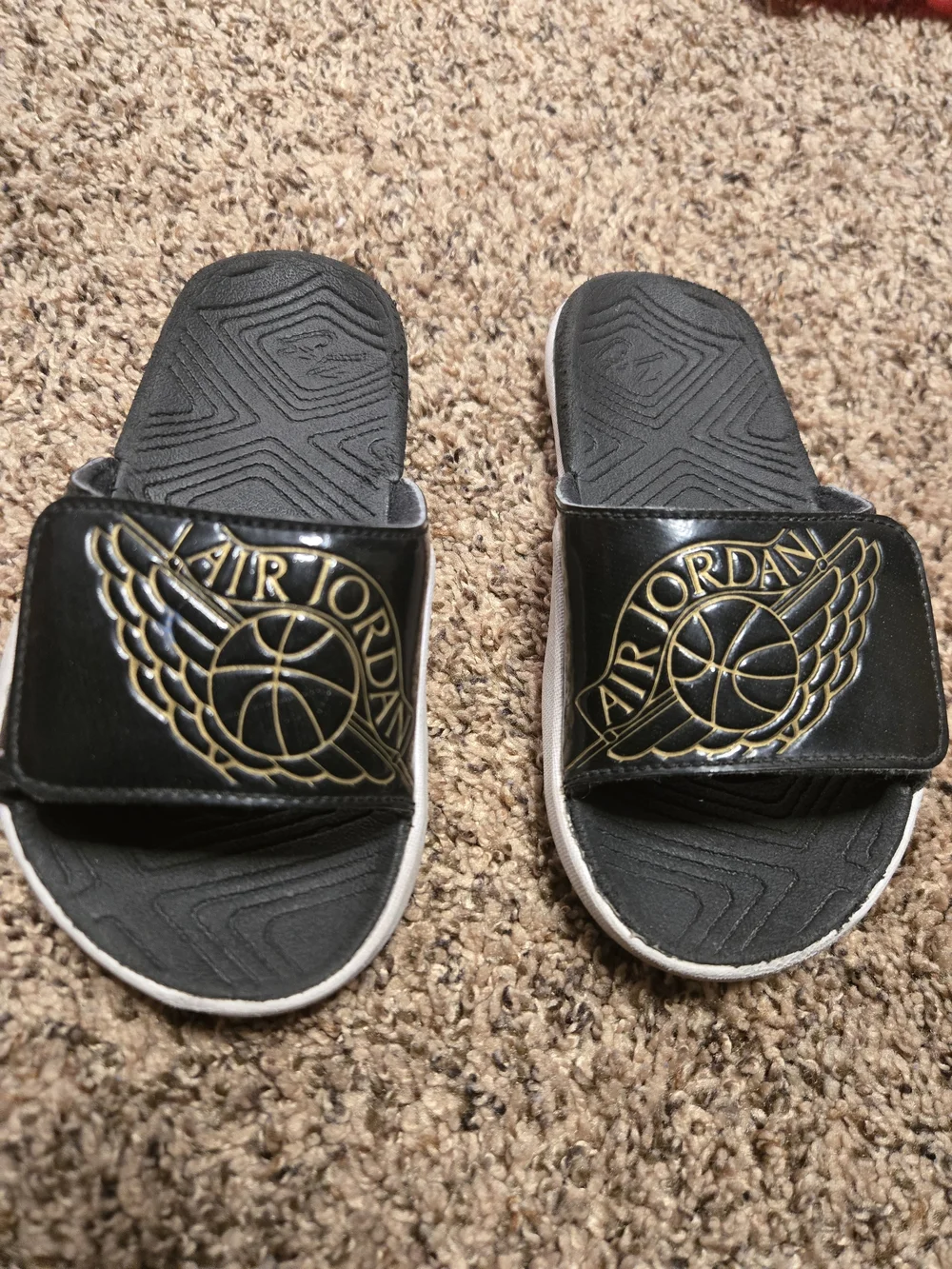 *Size 11* Air Jordan* Black and Gold Slides* Showing signs of being worn*